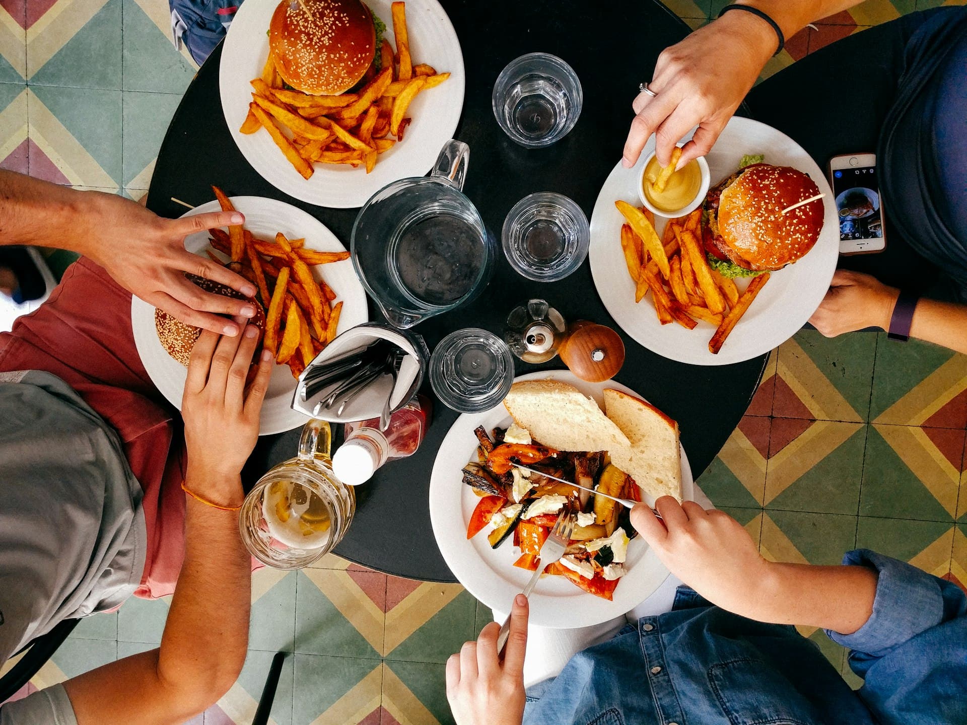People sharing a meal together outdoors